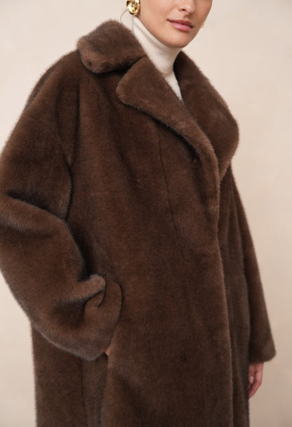 Long faux fur coat with lapel collar